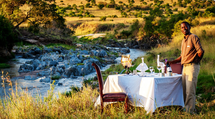 sand-river-masai-mara-dinner-set-up-with-view-4